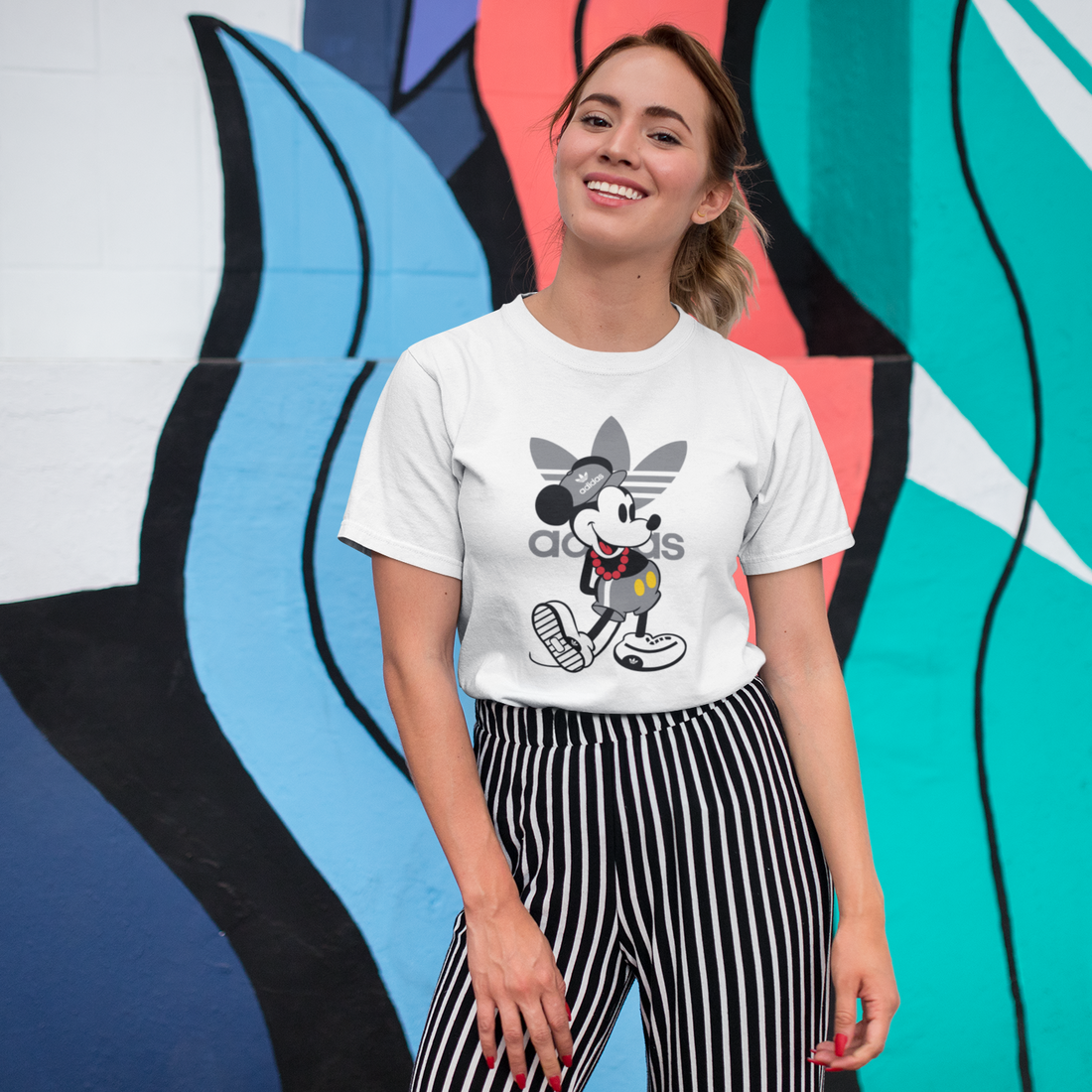 https://www.eastcoastclothing.co.uk/images/mickey-mouse-adidas-tee.jpg" alt="Mickey Mouse Adidas-Inspired Tee by East Coast Clothing"